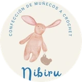 Logo de Nibiru: un conejito tejido con su osito