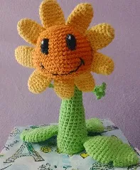 Girasol sonriente en maceta tejido a crochet